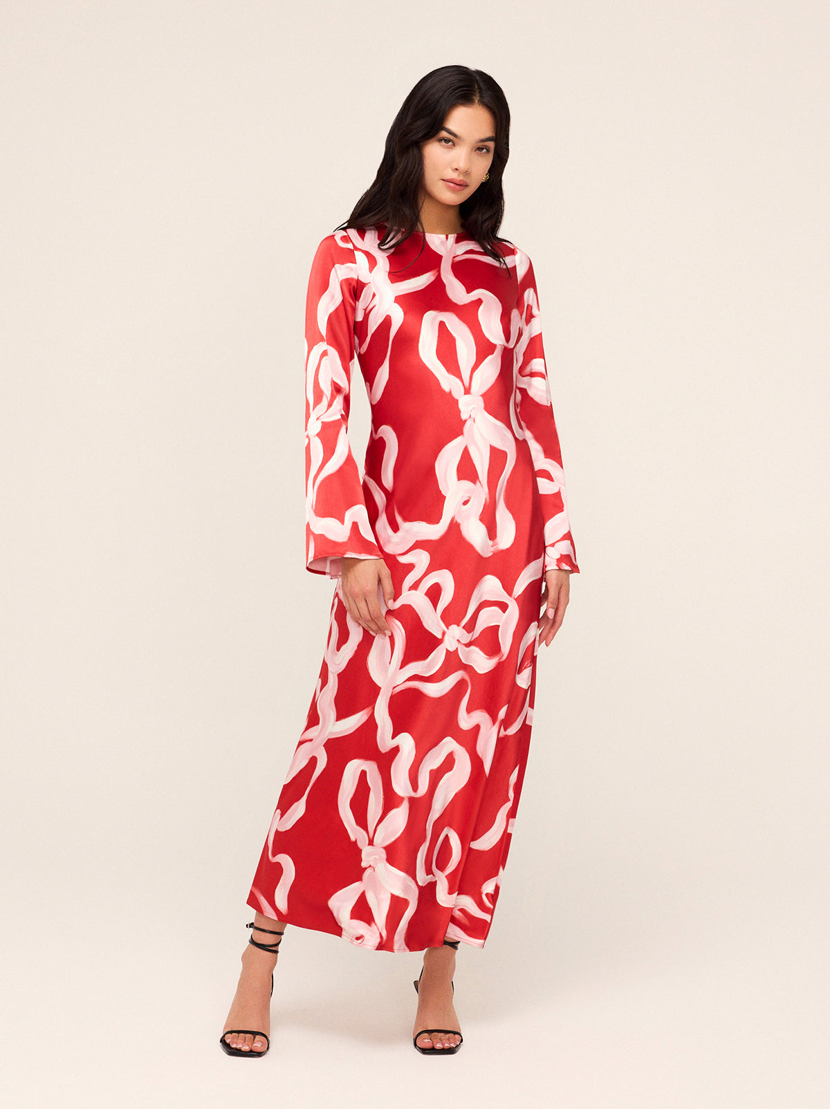 Keira Red Ribbon Print Maxi Dress - Keira is a bias-cut maxi dress with flared sleeves and a scoop neck. Her ballet-inspired ribbon print in KITRI favourite red and pink will live on in your wardrobe season after season. She looks great with heels and knee-high boots.