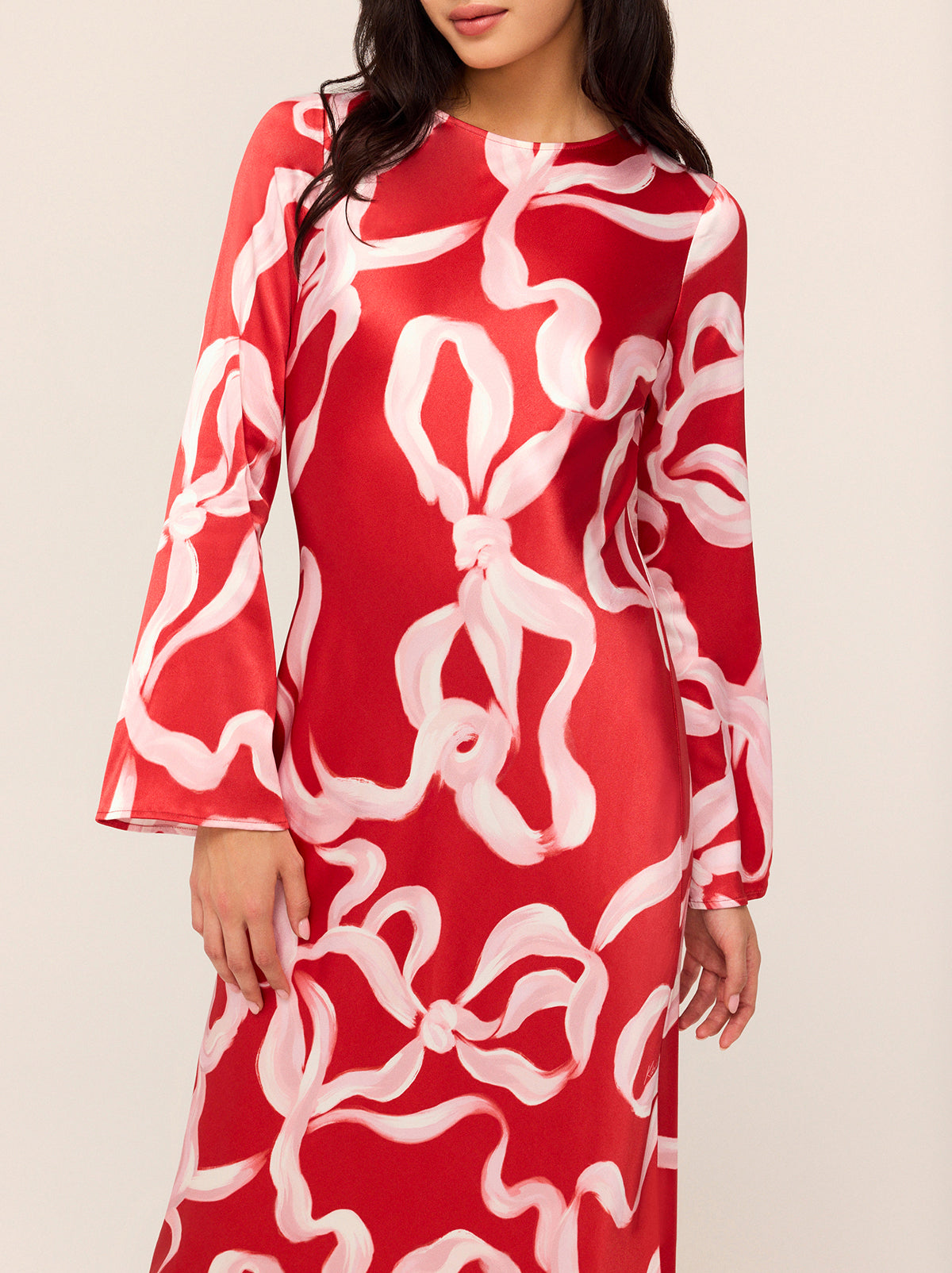 Keira Red Ribbon Print Maxi Dress - Keira is a bias-cut maxi dress with flared sleeves and a scoop neck. Her ballet-inspired ribbon print in KITRI favourite red and pink will live on in your wardrobe season after season. She looks great with heels and knee-high boots.