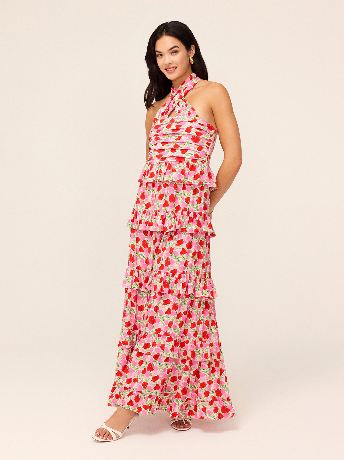 Romily Pink Floral Print Maxi Dress by Kitri Studio. The Romily Dress is here to make a statement.  Designed for effortless elegance, this maxi gown features a flattering crossover neckline and a softly pleated bodice, creating a dreamy, feminine silhouette. Halter neckline. Concealed side-zip. Lined Bodice. 59%% Lenzing™ Ecovero™  Viscose 41%% Viscose.