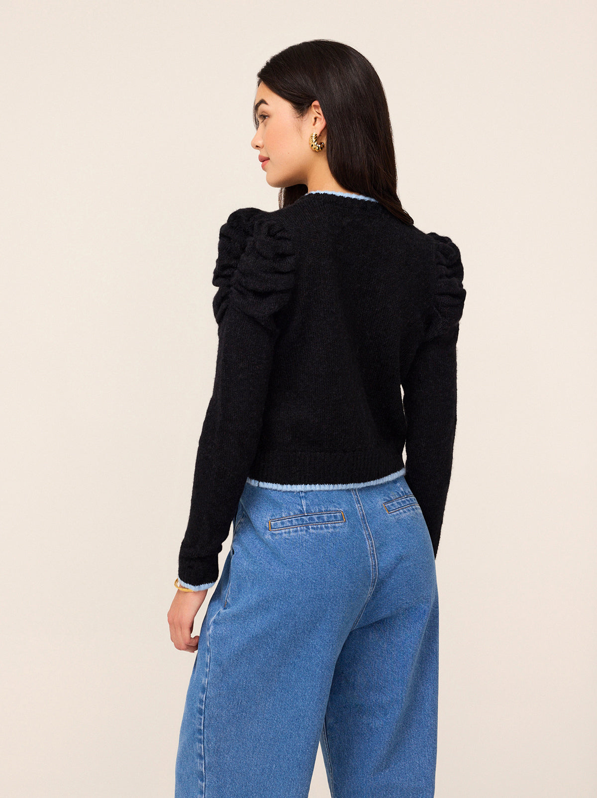 Matilda Black Knit Cardigan - Matilda is a chic black alpaca blend knitted cardigan with contrast pale blue trims and gathered shoulders. Throw over your favourite dress for a cosy layer, or pair with your favourite denim for an easy throw-on-and-go outfit.