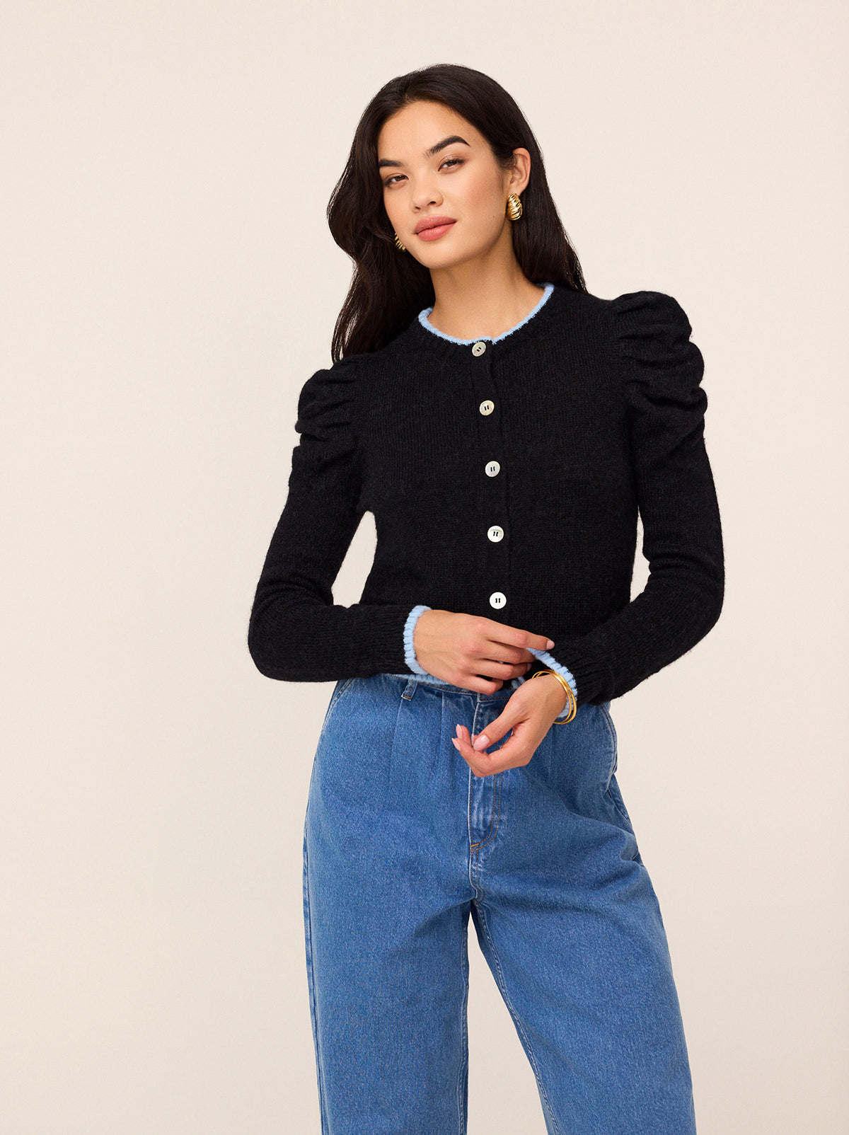 Matilda Black Knit Cardigan - Matilda is a chic black alpaca blend knitted cardigan with contrast pale blue trims and gathered shoulders. Throw over your favourite dress for a cosy layer, or pair with your favourite denim for an easy throw-on-and-go outfit.