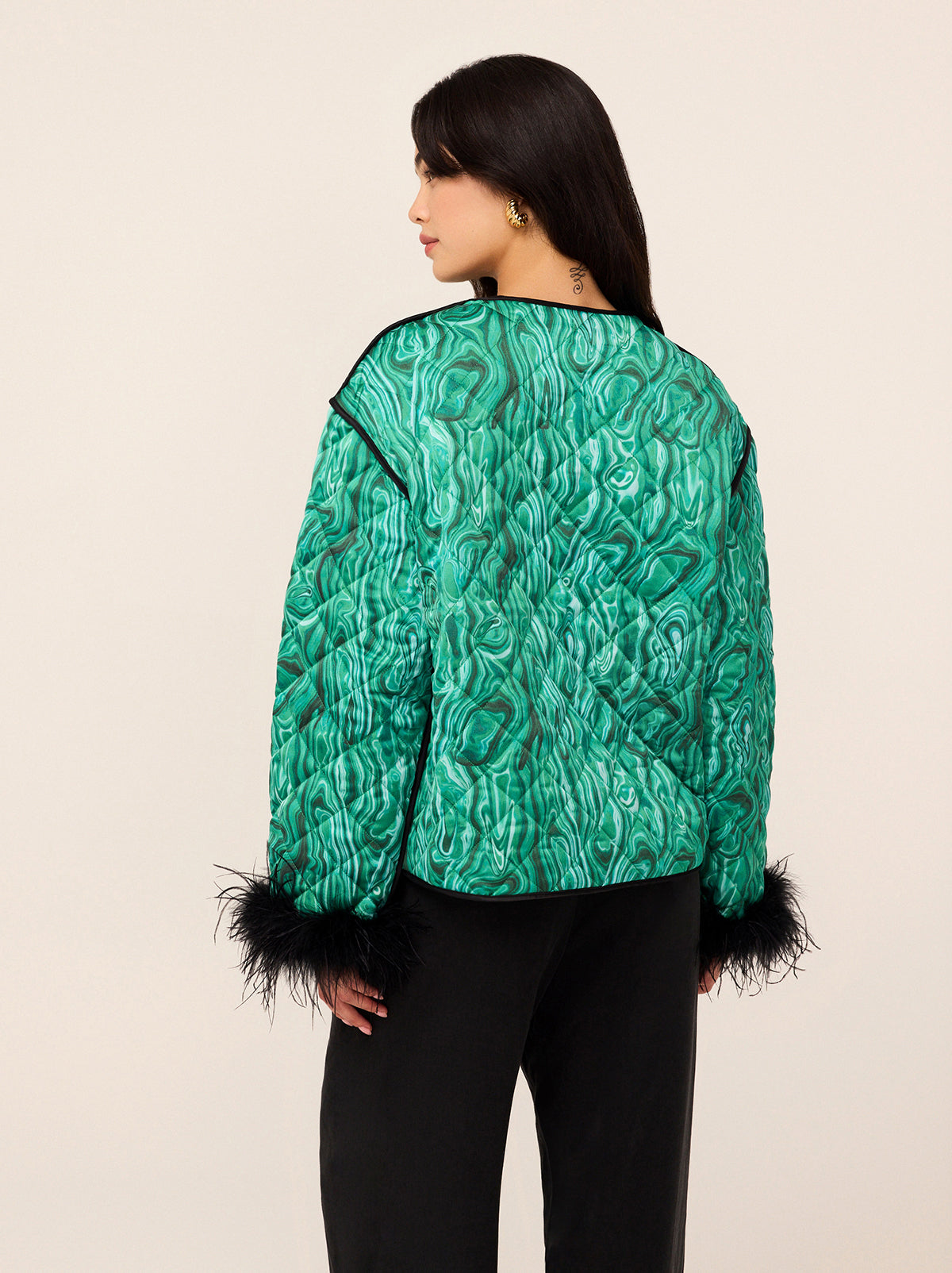 Theodora Green Malachite Print Quilted Jacket - Theodora features our best-selling Green Malachite print this season. She's a round neck, long sleeve jacket who's gently quilted for lightweight layering. She has patch pockets, functional ties and contrast black piping along the hem. We've added some feathered cuffs too.