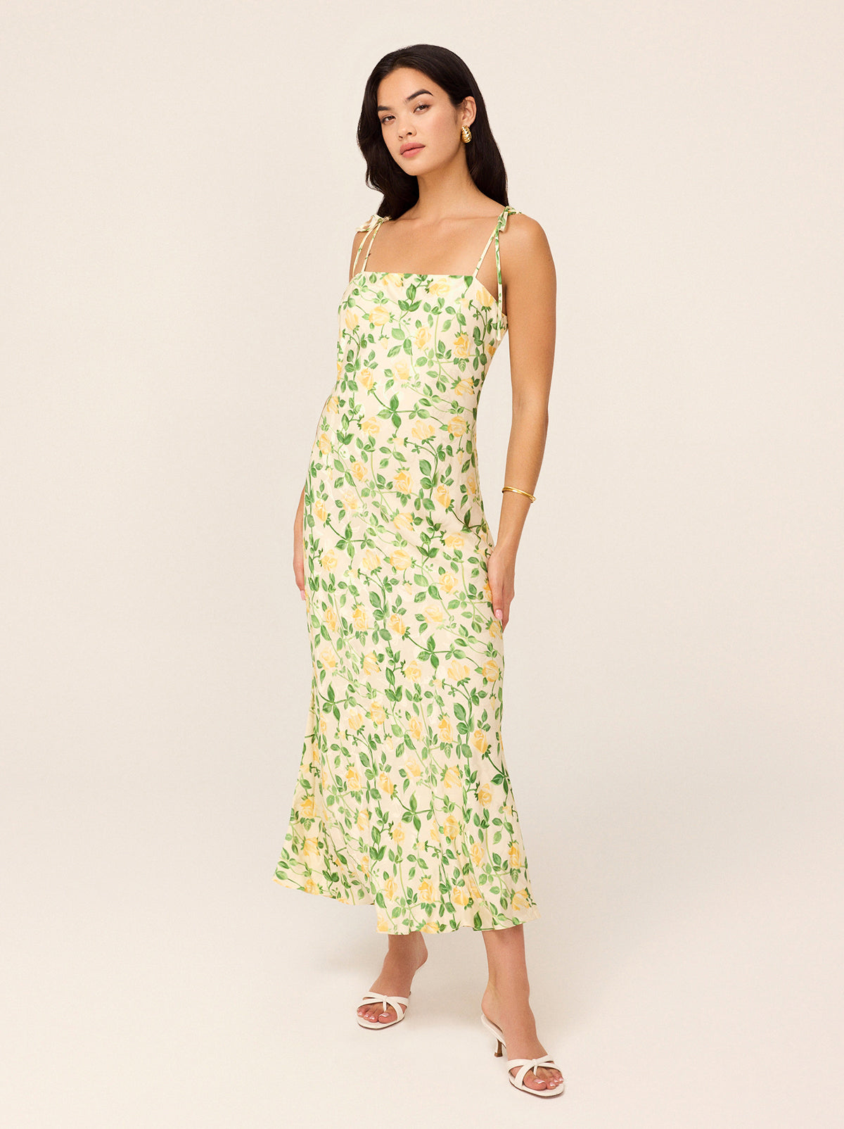 Giulia Yellow Rose Printed Jacquard Tie Shoulder Maxi Dress by Kitri Studio. Effortless elegance, wrapped up in a dress.  The Giulia Maxi Dress is designed in a bias-cut silhouette, draping beautifully to create a flattering, fluid fit. Straight neckline. Tie straps. Patch Pockets. 100%% Viscose.