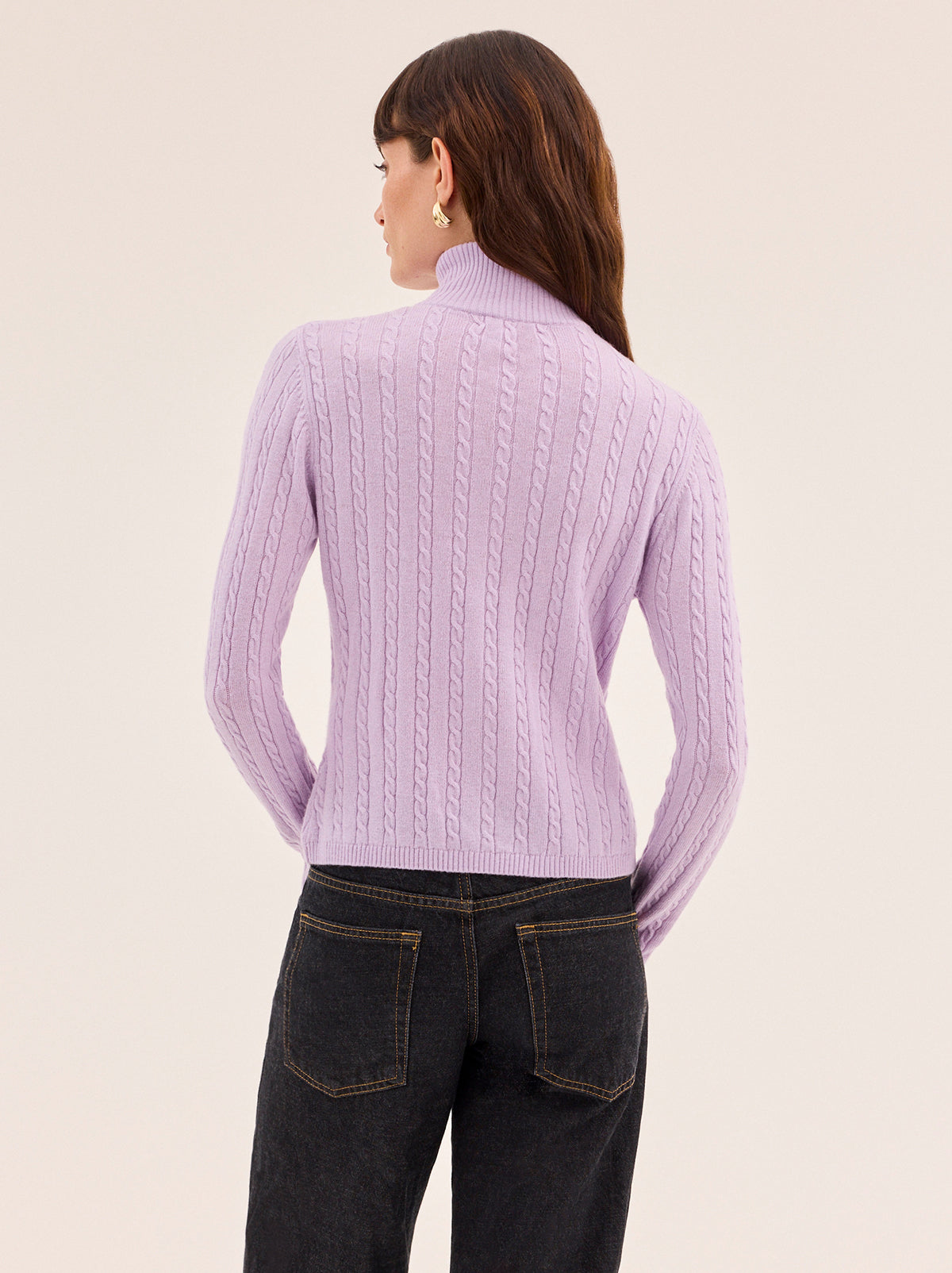Ameline Lavender Cable Fine Knit Top by Kitri Studio. Ameline Lavender Cable Fine Knit Top is crafted in a soft wool and cashmere blend that feels lightweight yet warm.  Designed with a feminine square-shouldered silhouette, it features a fine cable texture throughout and a sleek double-ended silver zip that allows for versatile styling. High neckline. Long sleeves. Ribbed cuffs. 48% Nylon, 27% Viscose, 20% Wool, 5% Cashmere.