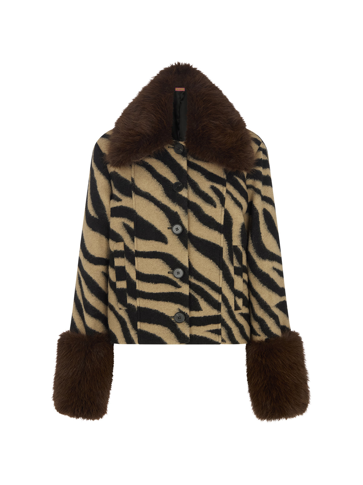 Bonnie Zebra Wool-Blend Jacket by Kitri Studio. Bestselling Bonnie returns in a bold zebra update, cut from a soft wool-blend for all-day comfort with a luxe finish.  Designed with a boxy silhouette, it’s detailed with detachable dark chocolate faux-fur trims at the collar and cuffs for a touch of drama. Collared neckline. Long sleeves. Button front. Main: 30% Wool, 70% Polyester Faux Fur: 100% Polyester.