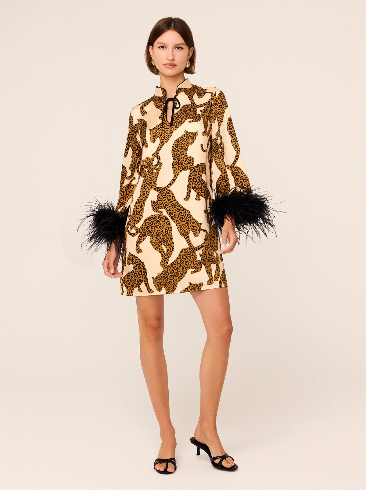 Carlotta Leopards Print Mini Dress - Carlotta is a party-ready mini dress in vintage-inspired Leopards print. Features a Cheongsam-inspired collar, detachable feathered cuffs and faux ties and a relaxed fit.