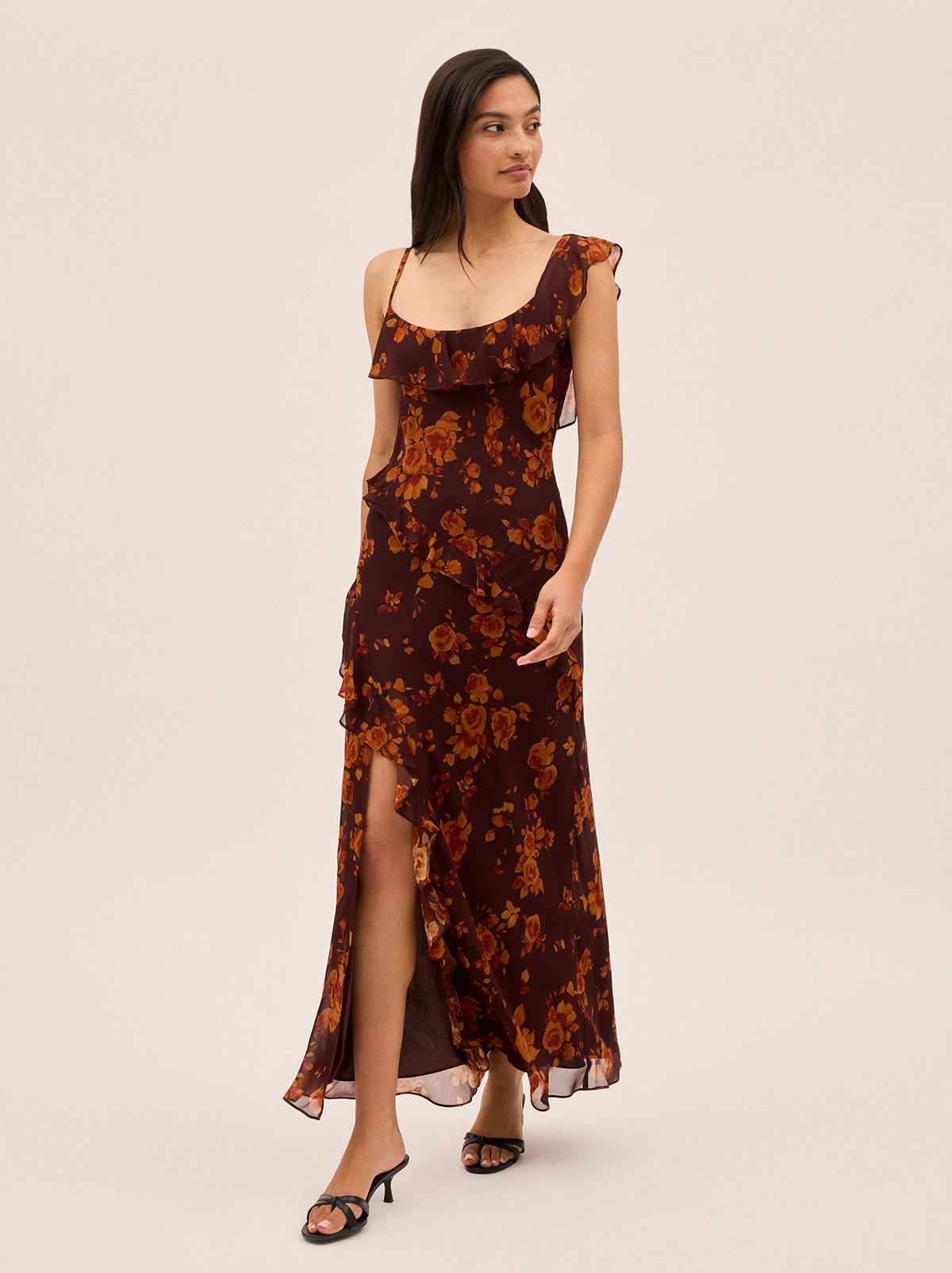 Delphina Autumn Rose Print Dress by Kitri Studio. Meet the dress everyone will be asking about.  The Delphina Dress is romantic maxi dress cut in a lightweight, fluid fabric and fully lined for a seamless fit. Scoop neck. Spaghetti straps. Concealed side-zip. 100%% Viscose Georgette.