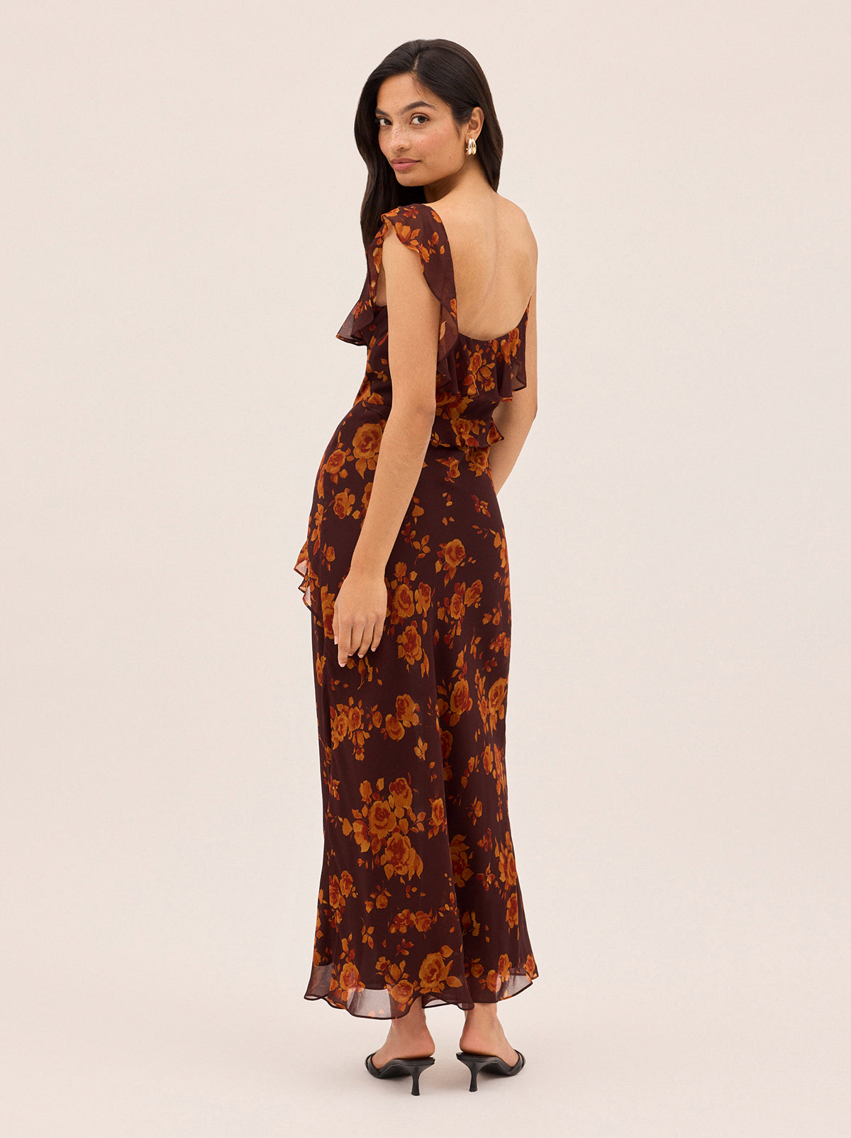 Delphina Autumn Rose Print Dress by Kitri Studio. Meet the dress everyone will be asking about.  The Delphina Dress is romantic maxi dress cut in a lightweight, fluid fabric and fully lined for a seamless fit. Scoop neck. Spaghetti straps. Concealed side-zip. 100%% Viscose Georgette.