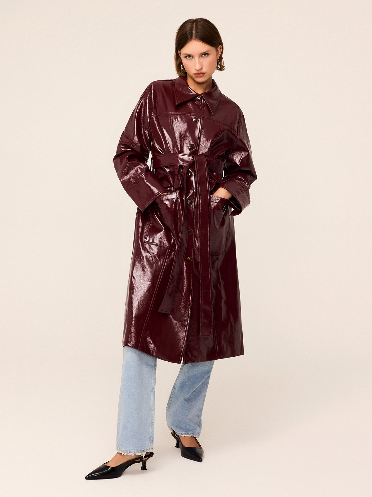 Dominique Oxblood Vinyl Coat - Dominique is an easy-fit vinyl car coat in sophisticated oxblood colour that will complete your outfit with a retro flare. Featuring exaggerated collars and patch pockets, wear with or without the belt depending on your mood.