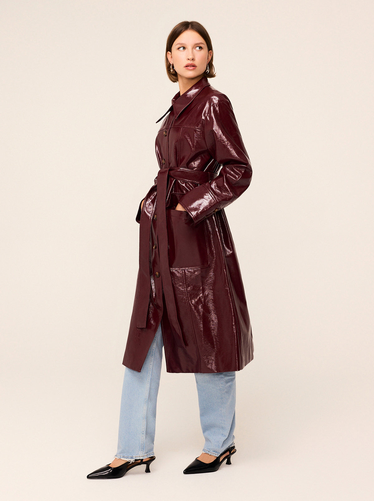 Dominique Oxblood Vinyl Coat - Dominique is an easy-fit vinyl car coat in sophisticated oxblood colour that will complete your outfit with a retro flare. Featuring exaggerated collars and patch pockets, wear with or without the belt depending on your mood.