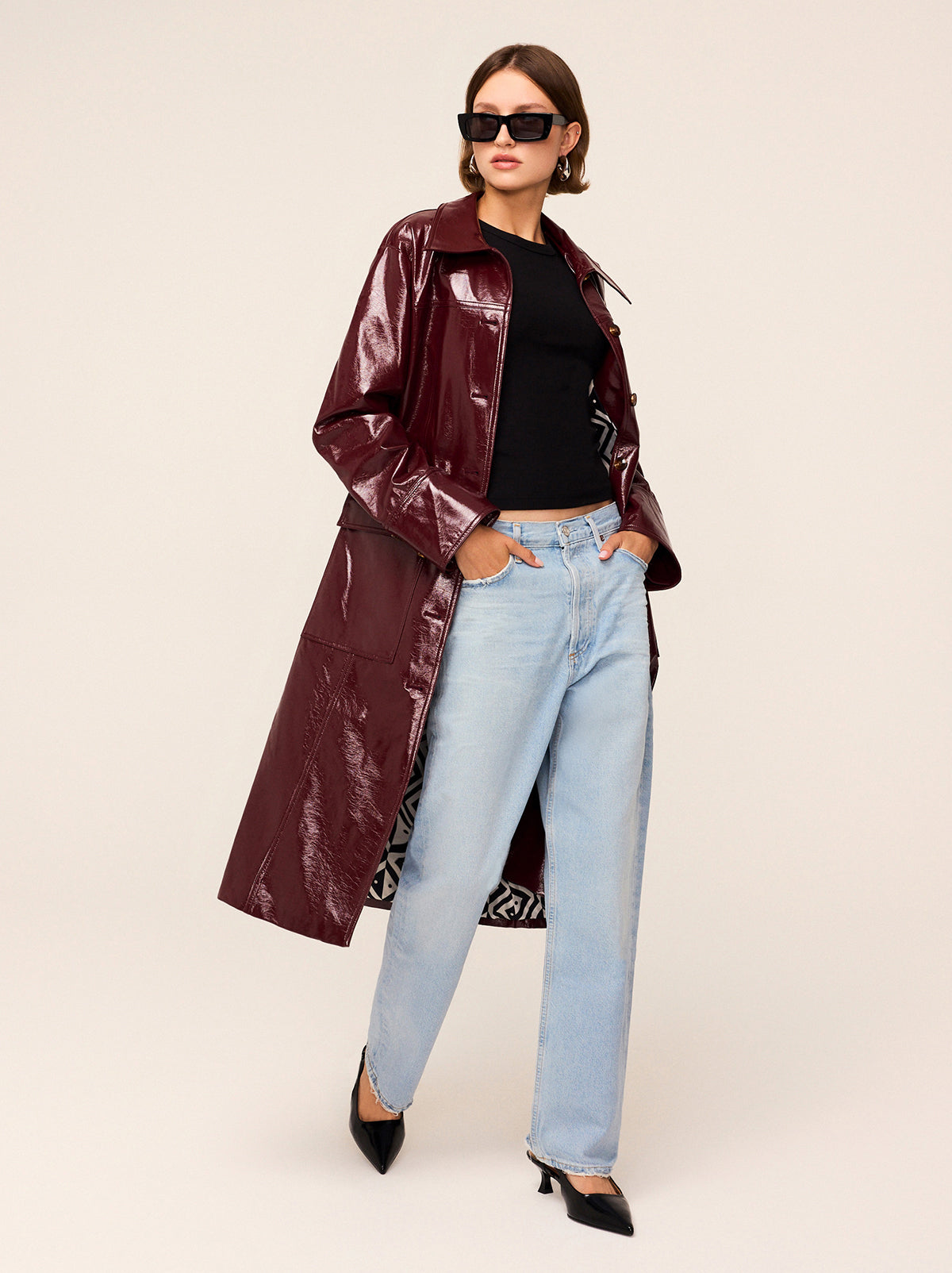 Dominique Oxblood Vinyl Coat - Dominique is an easy-fit vinyl car coat in sophisticated oxblood colour that will complete your outfit with a retro flare. Featuring exaggerated collars and patch pockets, wear with or without the belt depending on your mood.