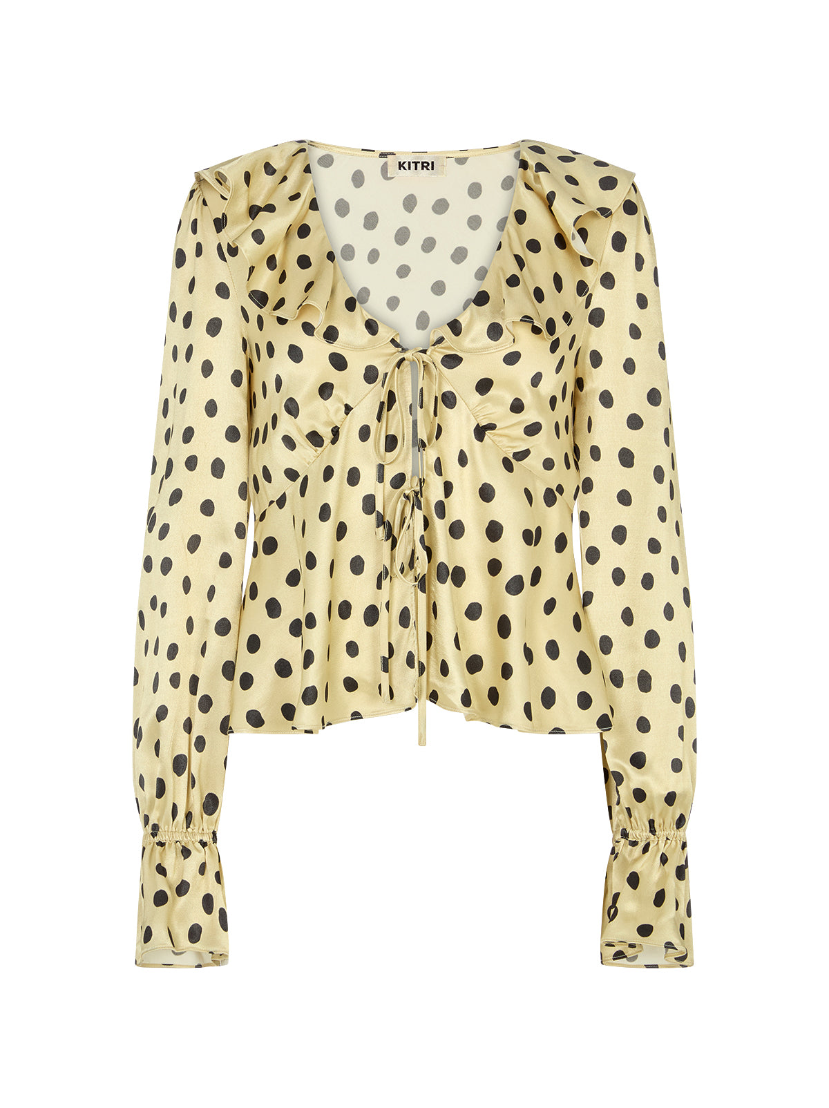 Ione Butter Polka Dot Satin Top by Kitri Studio. <span style="font-family: -apple-system, BlinkMacSystemFont, 'San Francisco', 'Segoe UI', Roboto, 'Helvetica Neue', sans-serif; font-size: 0. 875rem;">Romantic and effortless, the Ione top is new silhouette in soft, fluid viscose satin. V-neck. Long sleeves. Elasticated cuffs. 100% Viscose Satin.