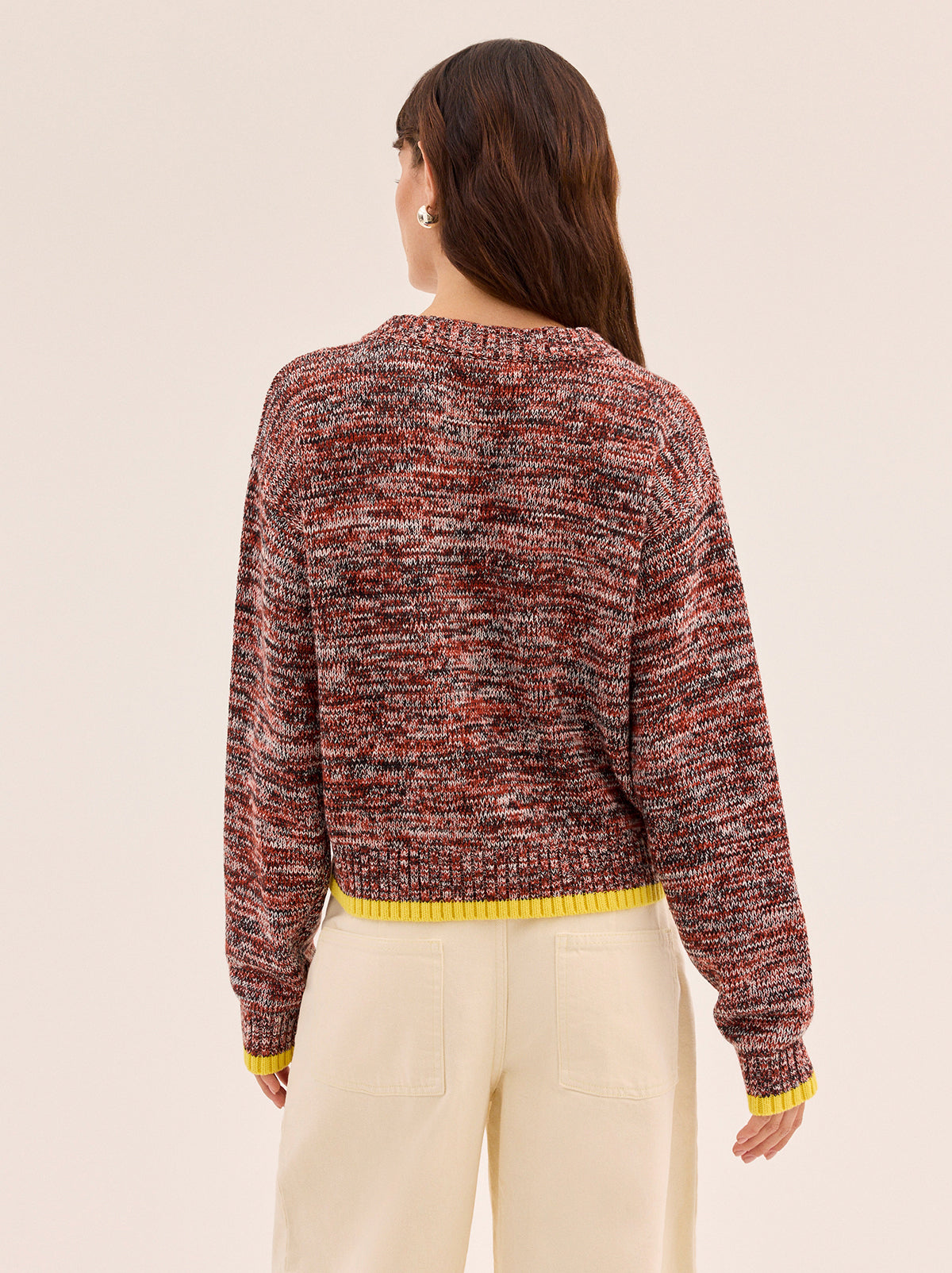 Francis Cotton-Blend V-neck Jumper by Kitri Studio. Francis Cotton-Blend V-neck Jumper is knitted from space-dyed soft cotton and wool blend that makes every piece feel unique.  Designed in a relaxed, boxy fit with a flattering V-neckline, it has an easy, throw-on feel that works well layered or worn solo. V-neck. Long sleeves. Ribbed cuffs. 60% Cotton, 30% Nylon, 10% Wool.