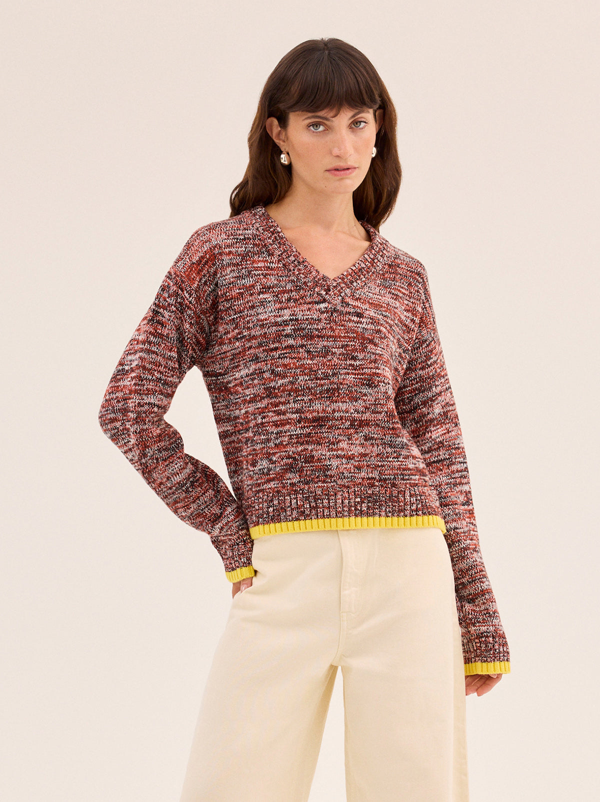 Francis Cotton-Blend V-neck Jumper by Kitri Studio. Francis Cotton-Blend V-neck Jumper is knitted from space-dyed soft cotton and wool blend that makes every piece feel unique.  Designed in a relaxed, boxy fit with a flattering V-neckline, it has an easy, throw-on feel that works well layered or worn solo. V-neck. Long sleeves. Ribbed cuffs. 60% Cotton, 30% Nylon, 10% Wool.