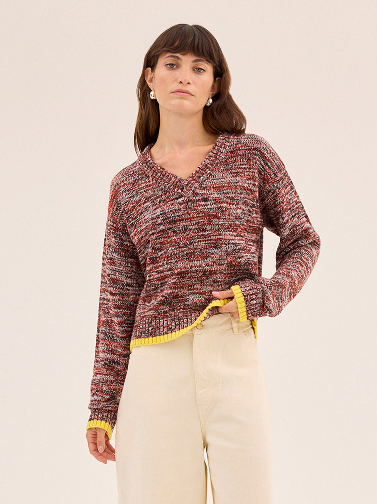 Francis Cotton-Blend V-neck Jumper by Kitri Studio. Francis Cotton-Blend V-neck Jumper is knitted from space-dyed soft cotton and wool blend that makes every piece feel unique.  Designed in a relaxed, boxy fit with a flattering V-neckline, it has an easy, throw-on feel that works well layered or worn solo. V-neck. Long sleeves. Ribbed cuffs. 60% Cotton, 30% Nylon, 10% Wool.