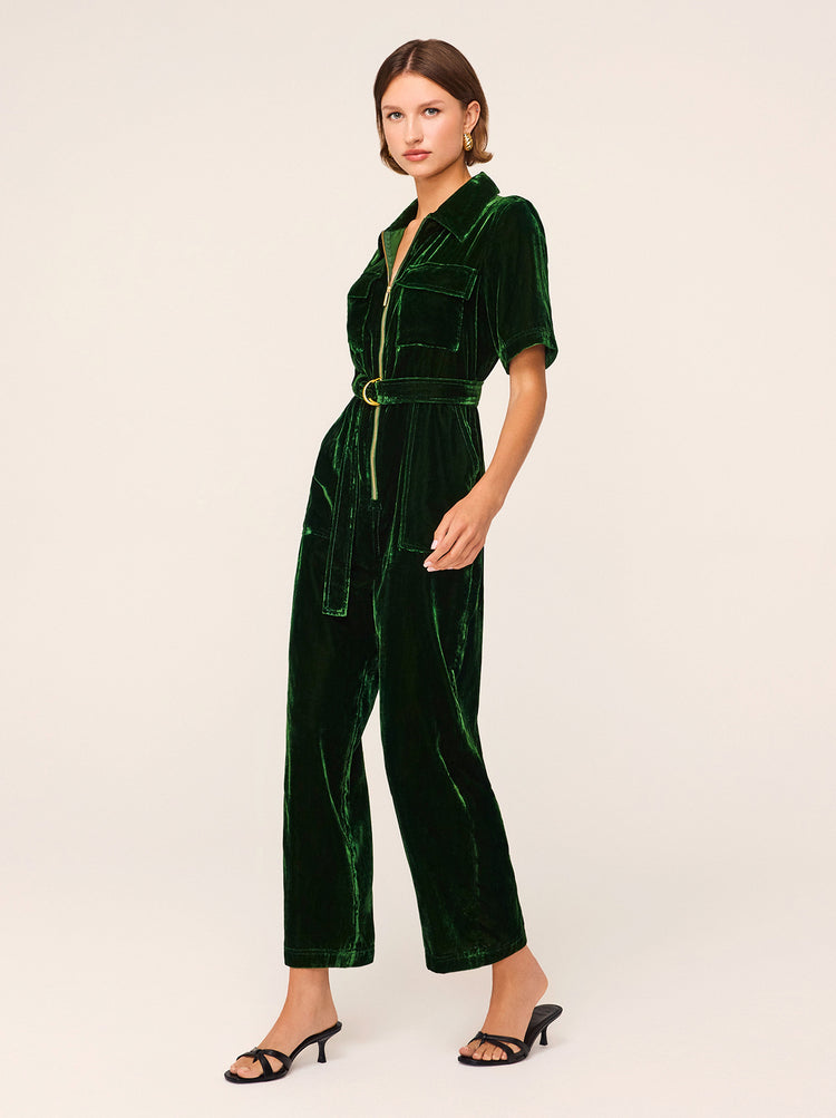 Serena Green Velvet Jumpsuit - One-and-done piece you need in your wardrobe. Serena is a fitted velvet jumpsuit in rich forest green velvet. Featuring a gold centre zip and patch pockets, it's relaxed through the leg with a slightly flared hem.