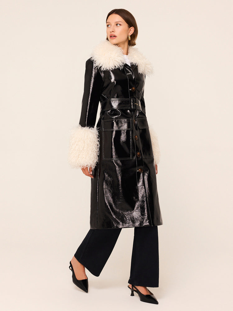 Simone Black Vinyl Coat - Simone is a black vintage-inspired vinyl coat with a removable faux-fur collar and cuffs for extra versatility. A relaxed fit with large patch pockets at the front, it comes with a buckled belt to cinch in at the waist. 