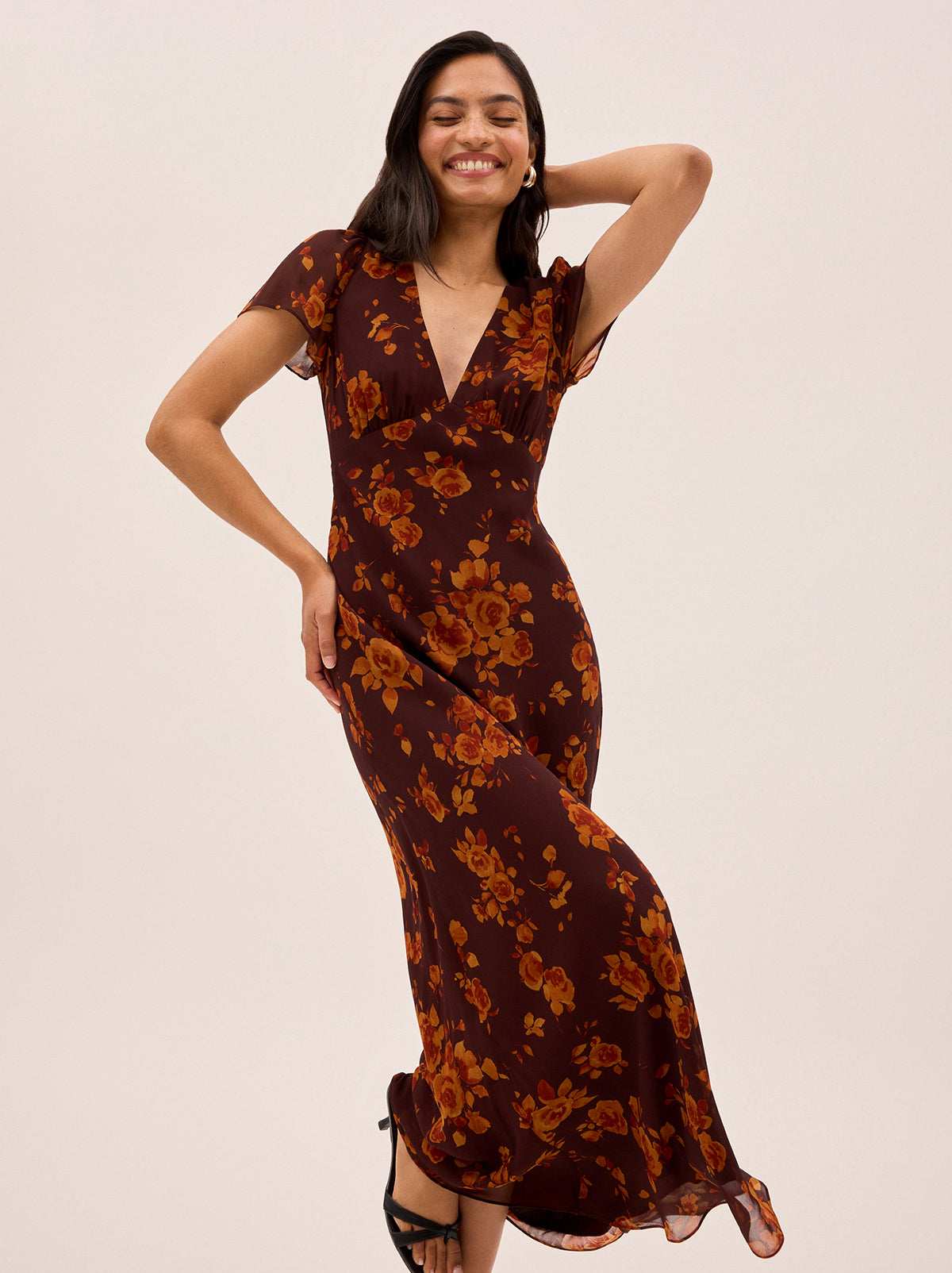 Talia Autumn Rose Print Dress by Kitri Studio. 
The Talia is a most-loved KITRI classic vintage-inspired midi dress.  Designed to be a true wardrobe hero, she features a flattering v-neck and a feminine bias-cut skirt that creates a beautifully fluid silhouette. V-neck. Short sleeves. Concealed side-zip. 100% Viscose Georgette.