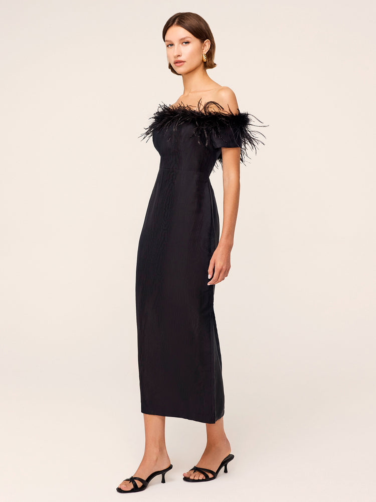 Vivien Black Feather Midi Dress - Vivien is a bandeau midi dress with feather trim and skirt split. Crafted from a premium viscose linen blend providing a subtle sheen and unique rippling effect. Her off-the-shoudler shape is secured with a silicone grip for ease of wear.