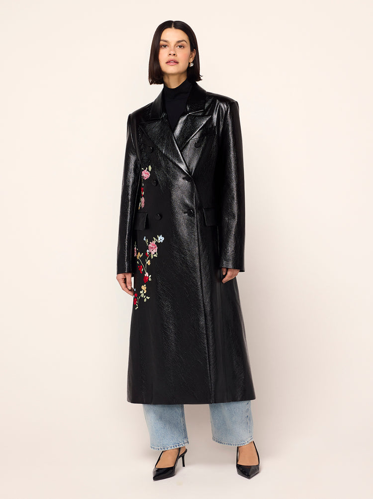 Brogan Oversized Black Embroidered Vinyl Coat - Brogan is an oversized, double-breasted coat in high-shine vinyl with an '80s-inspired statement shoulder and peaked lapel. Her bold silhouette is tempered by a tonal placement floral embroidery. Wear with co-ordinating Carolyn Black Embroidered Vinyl Mini Dress for the ultimate co-ord.