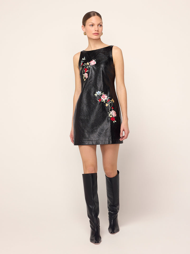 Carolyn Black Embroidered Vinyl Mini Dress - Carolyn is a '90s-inspired mini shift dress that skims the body. Her slash neck means she's bra-friendly too. Wear with co-ordinating Brogan Oversized Black Embroidered Vinyl Coat for the ultimate co-ord.