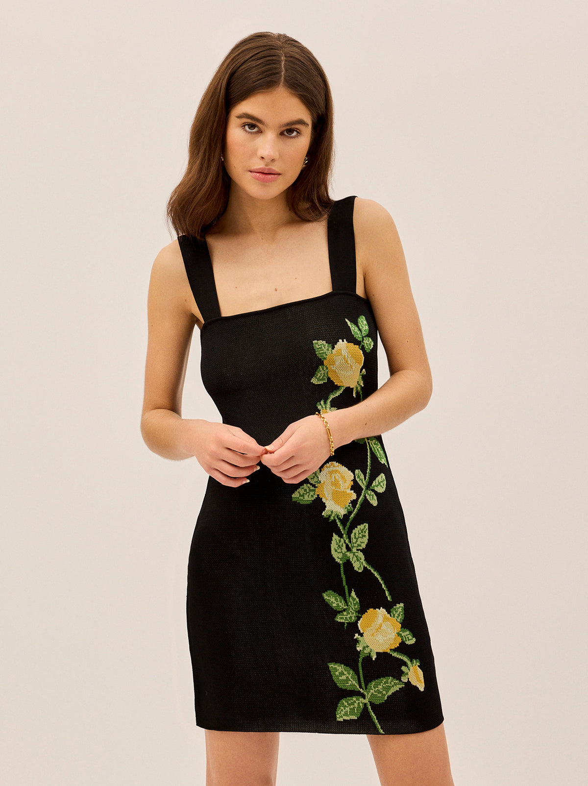 Corrine Black Rose Knit Mini Dress by Kitri Studio. For days (and nights) when you want to keep it simple, but make it a statement.  The Corrine Mini Dress is a sleek, figure-hugging knit designed with a square neckline and wide straps for a modern, structured feel. Straight neckline. Wide straps. Delicate. 32%% Acrylic 32%% Polyamide 14%% Alpaca 14%% Wool 8%% Elastane.