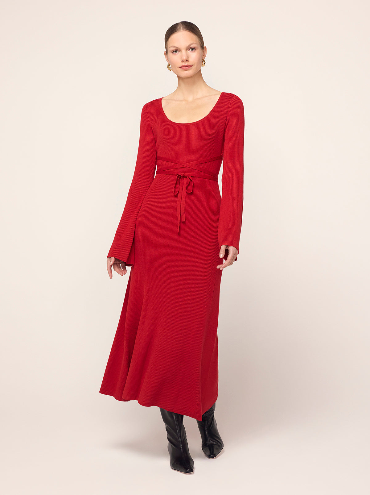 Darryl Red Ribbed Knit Dress - Darryl is a red ribbed knit midi dress with a flattering scoop neckline and feminine flare sleeves. Her ballet-inspired wrap-around tie waist detail flatters the silhouette. She'll look great with your favourite knee high boots.