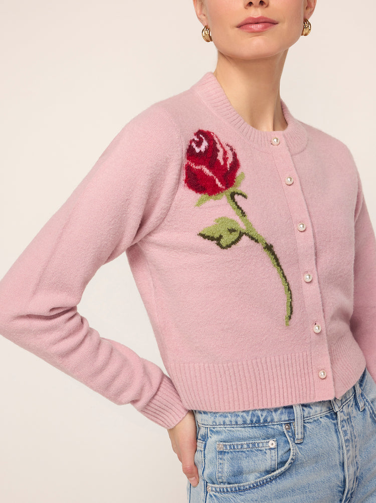 Ginnie Pink Rose Embroidered Cardigan - Ginnie is a scoop neck, relaxed-fit cardigan in ballet pink with pearl buttons and a rose jacquard design taking centre stage. She is great to pair with jeans as an extra transeasonal layer.