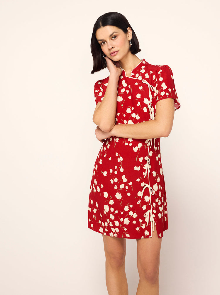 Harlow Red Scattered Tulip Print Mini Dress - Harlow is a Cheongsam-inspired mini dress cut from our Ecovero Viscose blend. Her in-house designed Scattered Tulip print in salsa red with co-ordinating tie details.