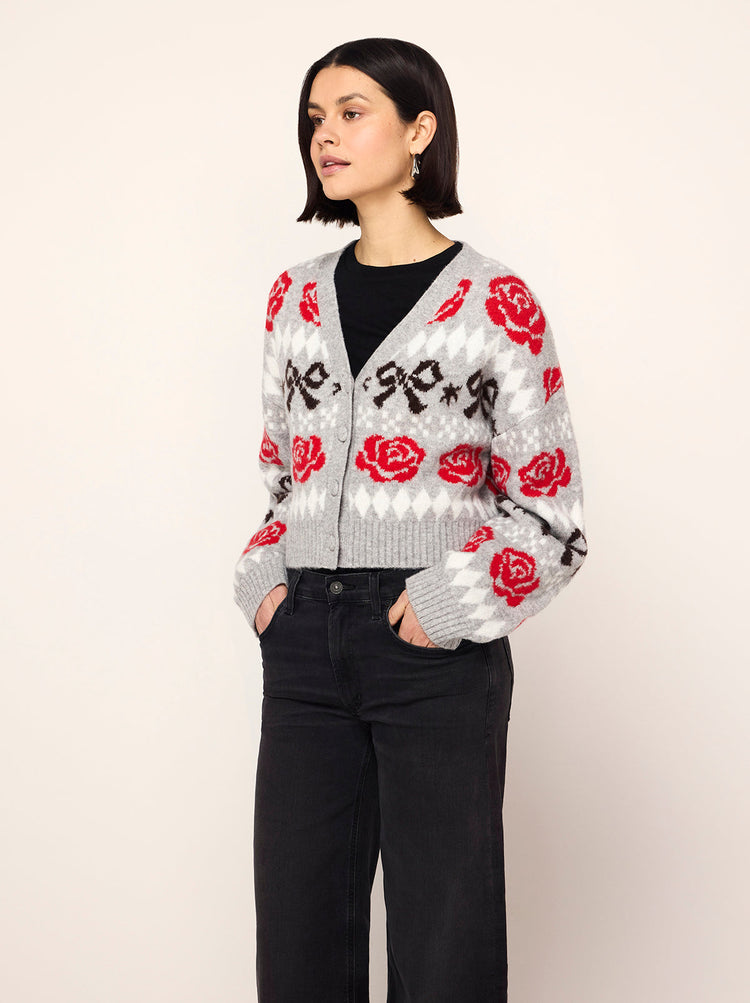 Joanne Grey Bow Fairisle Knit Cardigan - Joanne is a soft, cosy knitted cardigan featuring rose and ribbon fairisle. The boxy fit, balloon sleeves and V-neck make her a step above your average cardi. She'll look great with your favourite tee and jeans.