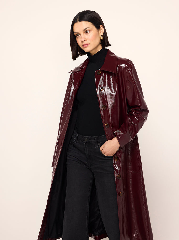 Simone Oxblood Vinyl Coat - Simone is a oxblood vintage-inspired vinyl coat with a removable faux-fur collar and cuffs for extra versatility. A relaxed fit with large patch pockets at the front, it comes with a buckled belt to cinch in at the waist.